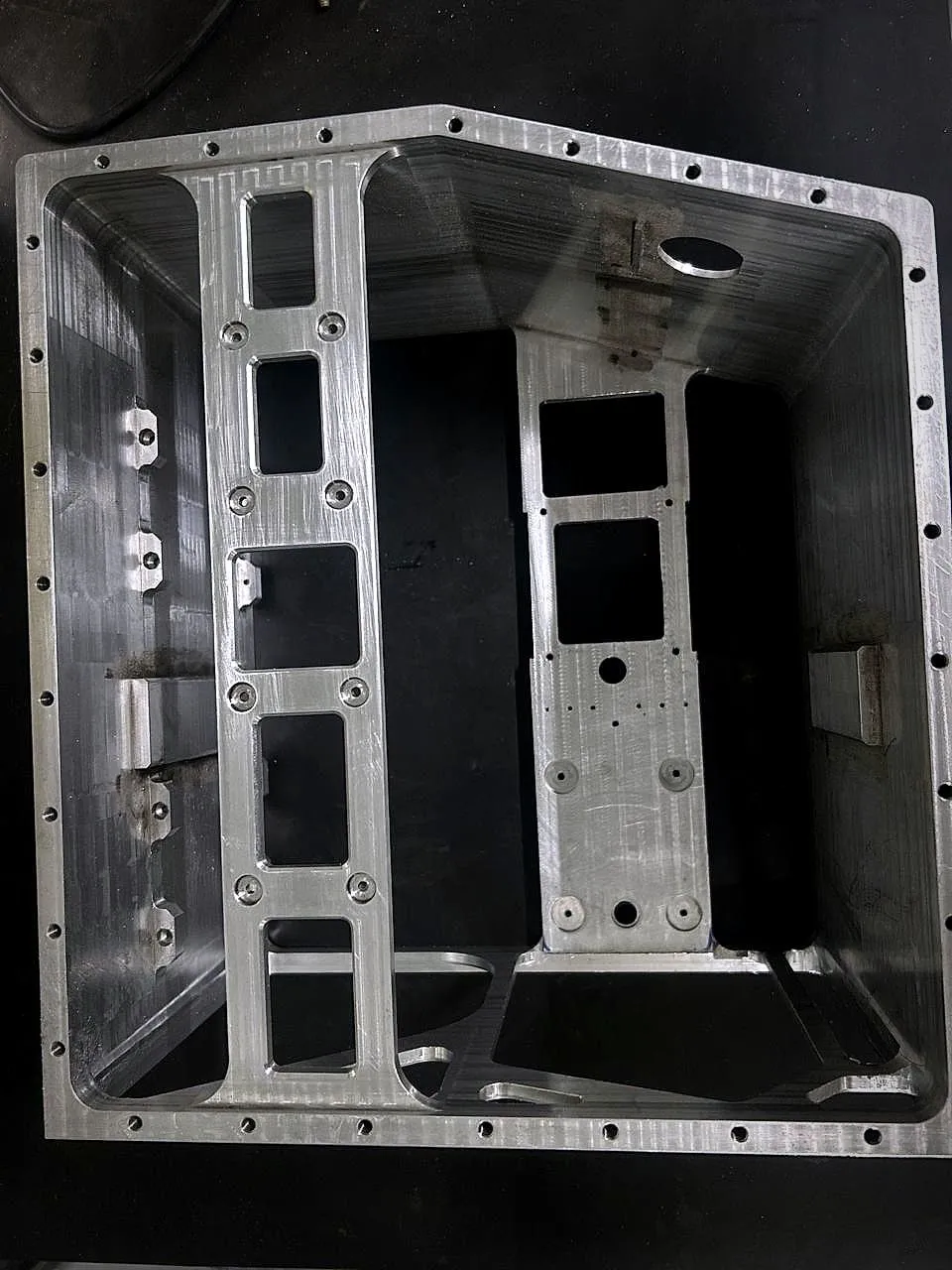 Large machined aluminium housing with internal ribs and pockets