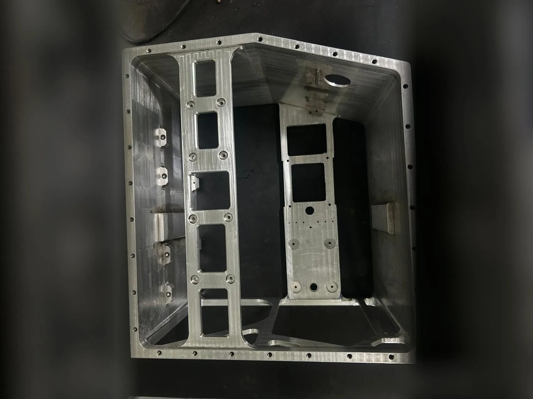Large machined aluminium housing with internal ribs, pockets and tapped holes